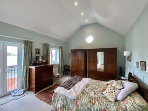 Bedroom One- click for photo gallery